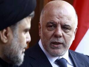 رئيس الوزراء العراقي حيدر العبادي والزعيم الشيعي مقتدى الصدر