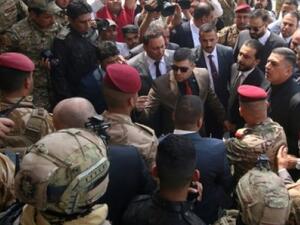 الحلبوسي لدى وصوله الى مقر حكومي في مدينة البصرة الثلاثاء
