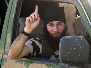 مقاتل تابع لتنظيم الدولة الاسلامية في بلدة كوباني السورية
