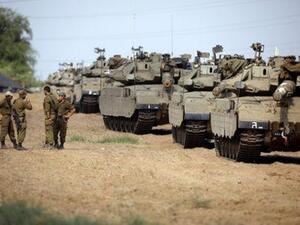 إسرائيل تعزز قواتها المدرعة على حدود غزة
