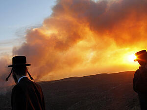 الحرائق تستعر في انحاء اسرائيل