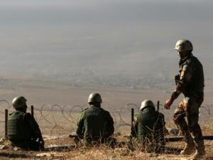 مقاتلون من البشمركة يتمركزون على قمة جبل زردك على بعد 25 كلم شرق الموصل

