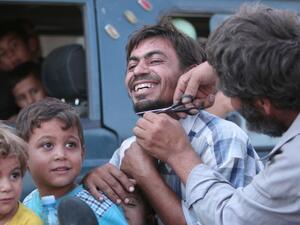 اهالي منبج يحتفلون بتحريرها من تنظيم "داعش"
