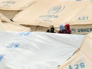 نازحات هربن من عنف تنظيم الدولة الإسلامية بالقرب من الموصل
