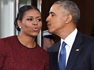 الرئيس الأمريكي السابق باراك اوباما وزوجته ميشال