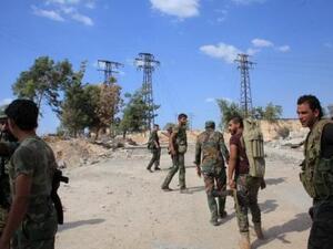 قوات موالية للرئيس السوري بشار الاسد في حلب
