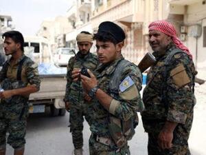 مقاتلون من قوات سوريا الديمقراطية في الرقة
