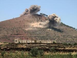 الدخان يرتفع من تلال في محافظة درعا قرب محافظة القنيطرة اثر قصف قامت به القوات الحكومية السورية

