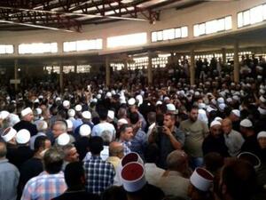 مراسم جنازة جماعية لقتلى سقطوا في هجمات انتحارية على السويداء
