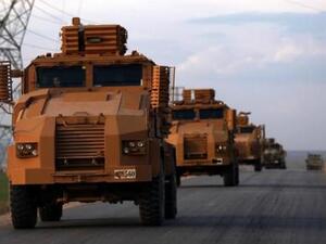 مركبات عسكرية تركية تتجه نحو بلدة الباب في شمال سوريا 
