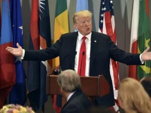 الرئيس الأميركي دونالد ترامب يتحدث خلال غداء عمل أقامه الأمين العام للامم المتحدة أنطونيو غوتيريش في نيويورك
