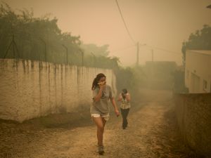 Mayor of Pedrogao Grande, Valdemar Alves, said that some villages had been "completely surrounded by flames." (AFP) 