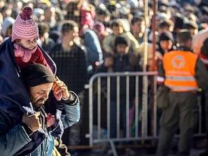 Refugees wait to cross the Slovenian-Austrian border from the Slovenian city of Sentilj. (AFP/ File Photo)