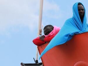 Migrants wait to disembark from the Aquarius rescue Ship run by NGO S.O.S. Mediterranee and Medecins Sans Frontieres in the port of Salerno after a rescue operation in the Mediterranean sea, on May 26 2017. (Carlo Hermann/AFP)