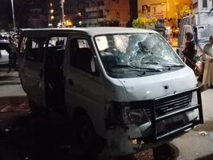 The remains of the police bus, shot at by multiple masked gunmen. (AFP/Stringer)