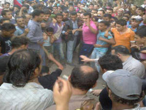 An angry mob beating in a Shiite village in Zawya Abu Muslam. Four were confirmed dead, but police did manage to save an additional 46. A closer look at the killings reveal the political strife in Egypt. (Source:Hazem Barakat) An angry mob beating in a Shiite village in Zawya Abu Muslam. Four were confirmed dead, but police did manage to save an additional 46. A closer look at the killings reveal the political strife in Egypt. (Source:Hazem Barakat)