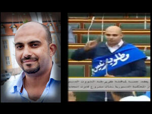 Abdulrahman Huraidi wearing a blue sash labeled “a new president is needed.” (Al Arabiya English screenshot)