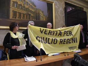 The parents of Italian student Giulio Regeni hold a banner reading ''Truth for Giulio Regeni'' during a press conference in Rome March 29, 2016.  (AFP/Andreas Solaro)