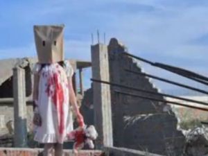 The photos, staged to depict bloodied children in Syria, were taken in an abandoned building near the Suez Canal. (Twitter)