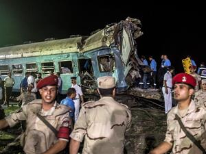Dozens were killed and many more injured near Alexandria after two trains collided into each other (AFP)