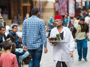 A man serving tea in Cairo. (Shutterstock/ Orhan Cam)