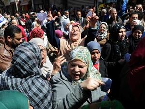 Dozens of Egyptians take part in demonstration in front of a government office in downtown Alexandria on March 7, 2017, against cuts in government bread subsidies. [AFP]