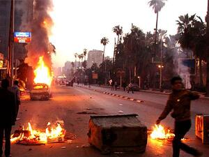 Protesters and riot police clash during 2013 protests in Alexandria. (AFP/File)