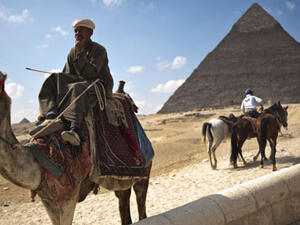 A total of 41,042 Egyptian and foreign tourists visited the Giza Pyramids during the three days of Eid. (AFP/File)