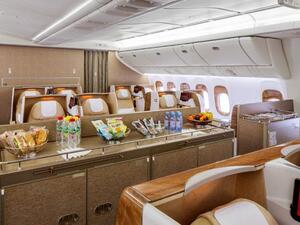 The new business class cabin features a social area – a mini lounge with snacks, sandwiches, fruits, and beverages. (Photo: Emirates)