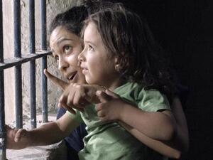 The film is the story of a young newlywed Palestinian school teacher who is jailed in a top-security Israeli prison where she eventually gives birth. (TIFF)
