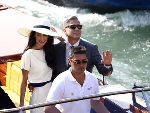 In 2014, George led a parade of boats down the Grand Canal ahead of his wedding to international human rights lawyer Amal, 38. (File photo)