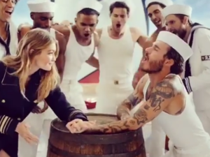 Gigi Hadid beats a tattooed sailor in a sneak-peak of her upcoming Tommy Hilfiger campaign posted on her 
Instagram. (Instagram)