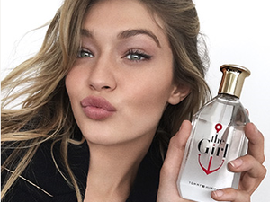 Ahoy there! Gigi dons a sailor suit for the nautical-themed perfume ad. (Tommy Hilfiger)