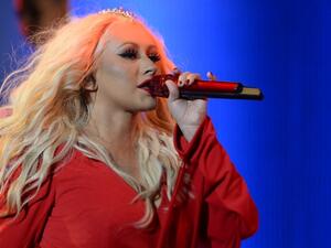 The Voice coach treated the audience to her catalog of hits including Beautiful, Cnadyman and Dirrty. (AFP/Fadel Senna)
