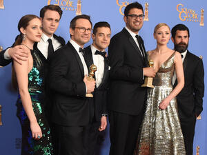 The cast of Mr Robot, with Rami Malek (center) celebrating their Golden Globe wins in January 2016. (AFP/File) 