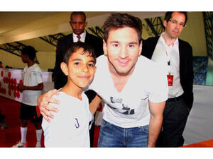 "Baghdad Messi" star with Barcelona football player (Photo supplied by director Sahim Omar Khalifa)
