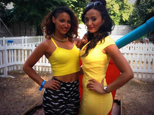 Amelle Berrabah (L) sportin' her outfit that was not sunlight proof! (Image: Twitter)