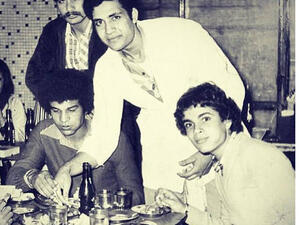 Unlike his shaved-head look now, Amr had a full set of curly hair when he was a young man. (Image: Facebook)