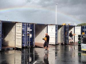 Underneath a gorgeous rainbow, the crew loaded 40 containers for the long haul to Dubai. (Image: Facebook)