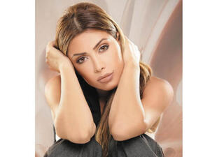 Nawal Al Zoghbi is ready to release a new single on Arab Idol this week