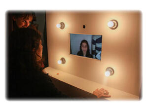 Lady tries photo-booth installation at Medrar Gallery, Friday 22 February. Photo: Mostafa Sheshtawy