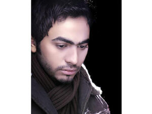 Tamer tones down with new film on hold.