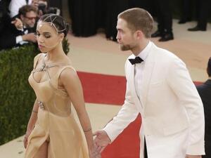 Robert Pattinson and sort-of fiance FKA twigs. (John Angelillo / UPI)