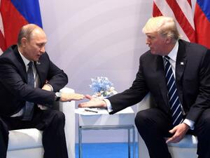 According to a White House statement, Trump thanked Putin for acknowledging America’s "strong" economic performance in his conference. (AFP/File)