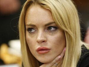Actress, Lindsay Lohan, plans to help Syrian refugees in Turkey this January. (AFP/File) 