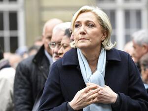 French presidential election candidate for the far-right Front National (FN) party, Marine Le Pen attends a ceremony honouring the policeman killed by a jihadist in an attack on the Champs Elysees, on April 25, 2017 at the Paris prefecture building. (AFP/Bertrand Guay)
