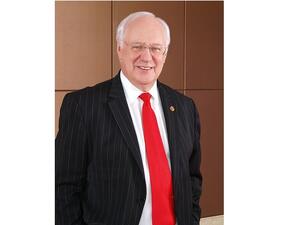 Gavin M. Faull, Chairman and President of Swiss-Belhotel International