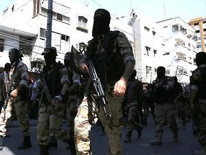 Palestinian Islamic Jihad militants parade down a street in downtown Gaza City on August 29, 2014. (AFP/File)