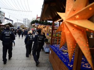 Police officers walk at the Christmas market near the Kaiser-Wilhelm-Gedaechtniskirche. (AFP/File)