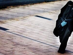 The initiative "Yes to a ban on face coverings" garnered more than the required 100,000 signatures last September to put the decision to a popular vote (AFP/File)